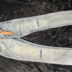 Distressed Light Blue Jeans